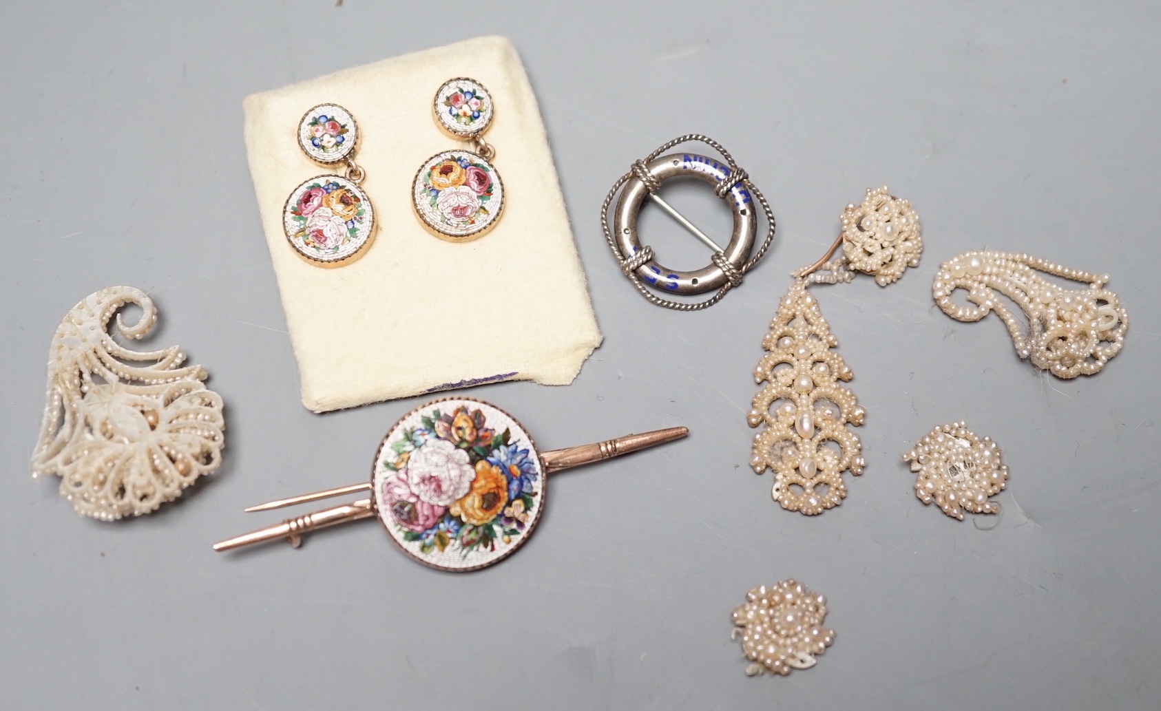 A suite of yellow metal and micro mosaic jewellery comprising a brooch, 72mm and pair of earrings, five items of seed pearl jewellery and a brooch.